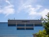 HSBC Faces Tens of Millions FCA Fine Over AML Failures HSBC headquarters building with signage, symbolizing the bank’s repeated regulatory penalties for money-laundering control lapses.